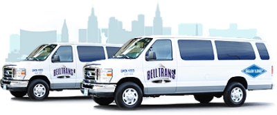 This is an image of two fleet vans for the Bell Trans Las Vegas Airport Shuttle Share-A-Ride Transfer service